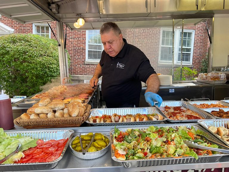 Preparing food in the festival trailer